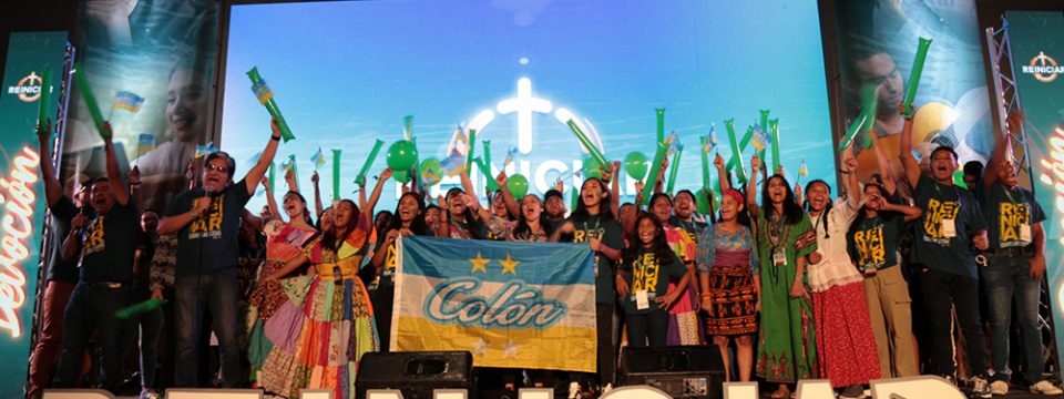 An Adventist youth delegation from Colon, Panama, show their enthusiasm as they salute the more than 1,700 attending the church’s first region-wide youth congress. [Photo: Panama Union Mission]