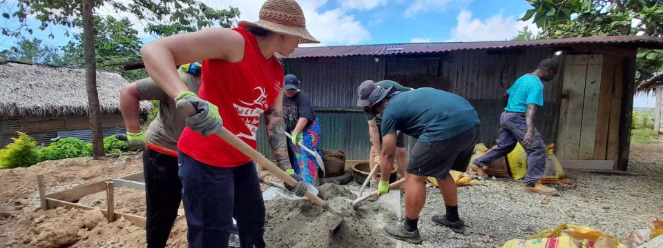 A team of ADRA volunteers builds latrines on the island of Vanuatu. [Photo: ADRA International]