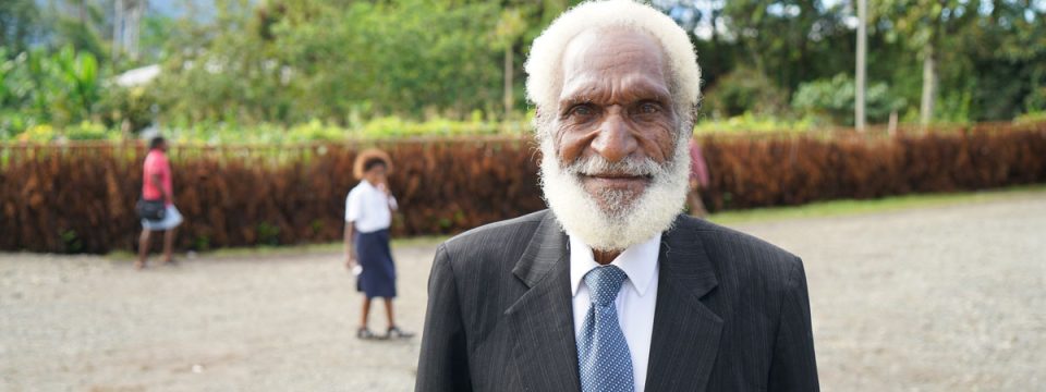Togoba founding church member and head elder Nori has been waiting 30 years for the church project to be finished. [Photo: Adventist Record]