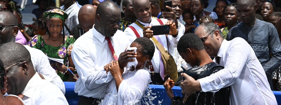 Two hundred and thirty-eight people receive baptism on the last day of the Pentecost 2024 evangelistic series in Cotonou, Benin, on April 27. [Photo: Abraham Bakari, West-Central Africa Division]